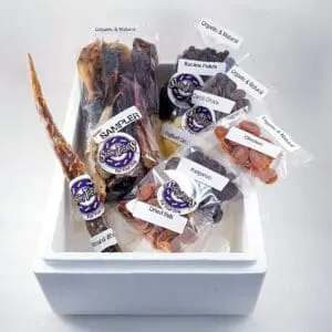 A white box filled with different types of food.
